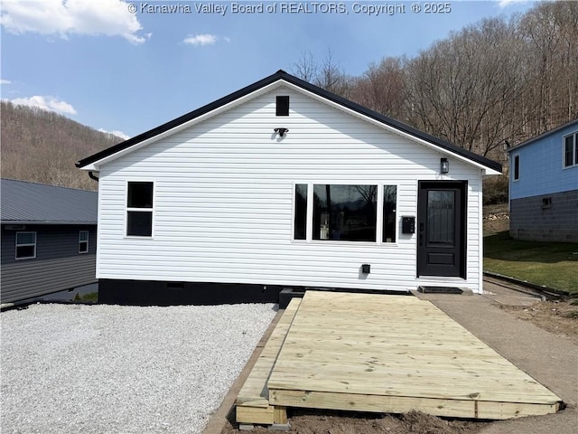 202 Josephine Ave, Madison, WV 25130 - rear view of property featuring crawl space and a wooden deck