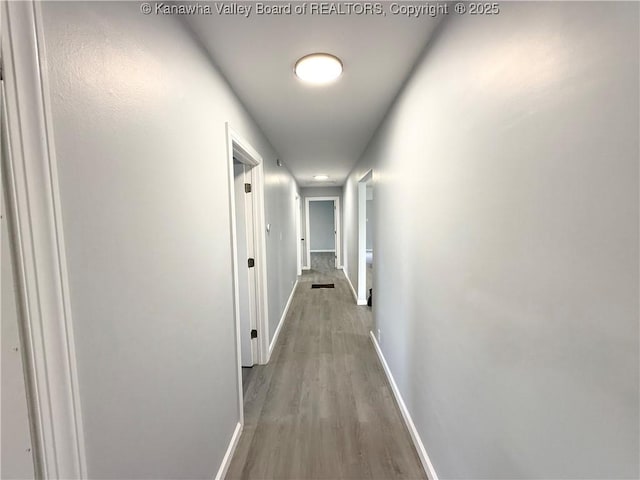 202 Josephine Ave, Madison, WV 25130 - corridor featuring baseboards and wood finished floors