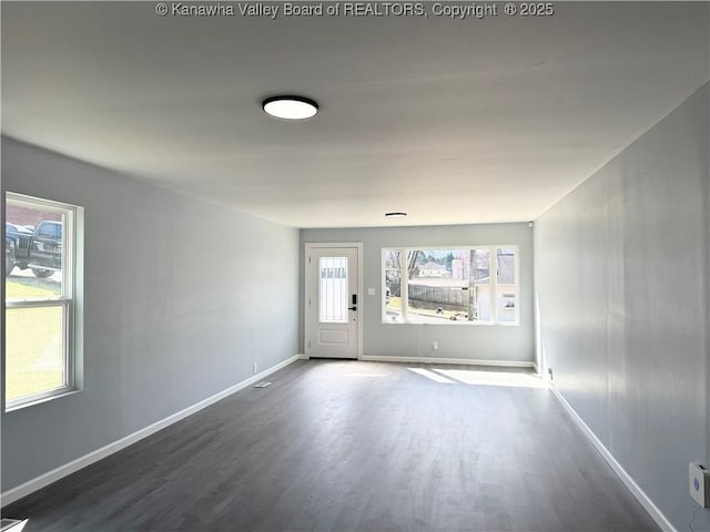 202 Josephine Ave, Madison, WV 25130 - empty room with dark wood finished floors and baseboards
