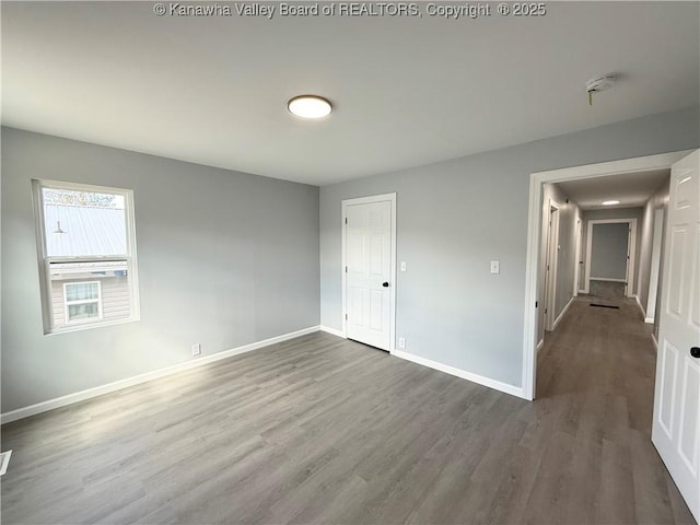 202 Josephine Ave, Madison, WV 25130 - empty room featuring wood finished floors and baseboards