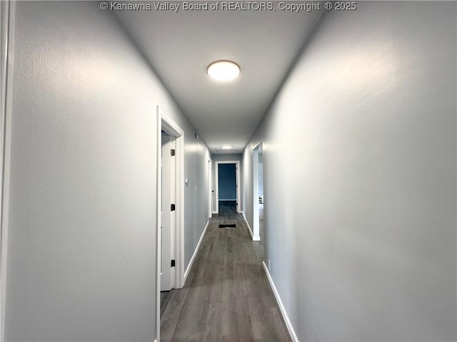 202 Josephine Ave, Madison, WV 25130 - hallway with baseboards and wood finished floors