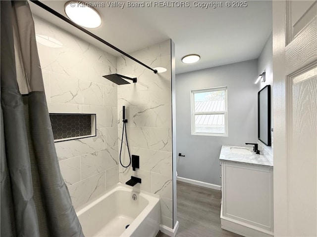 202 Josephine Ave, Madison, WV 25130 - full bath with shower / bath combo, vanity, baseboards, and wood finished floors