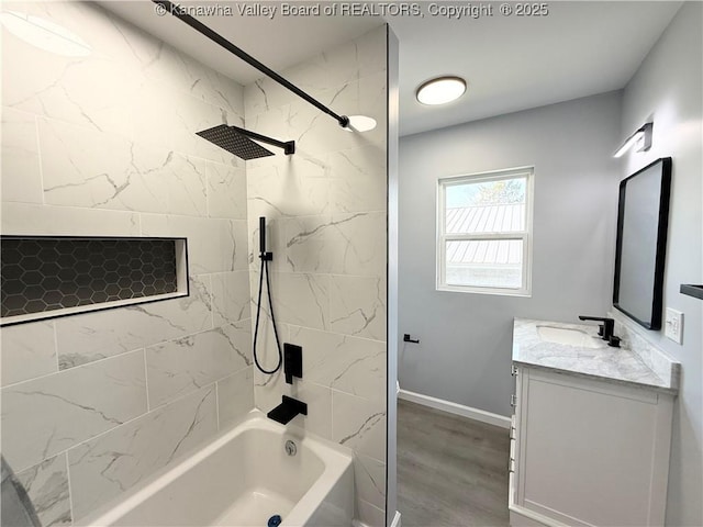 202 Josephine Ave, Madison, WV 25130 - bathroom featuring shower / bath combination, vanity, baseboards, and wood finished floors
