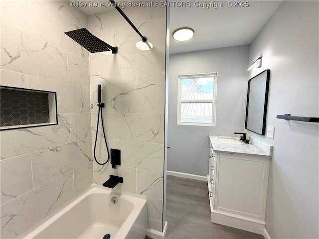 202 Josephine Ave, Madison, WV 25130 - bathroom featuring shower / bathtub combination, vanity, baseboards, and wood finished floors