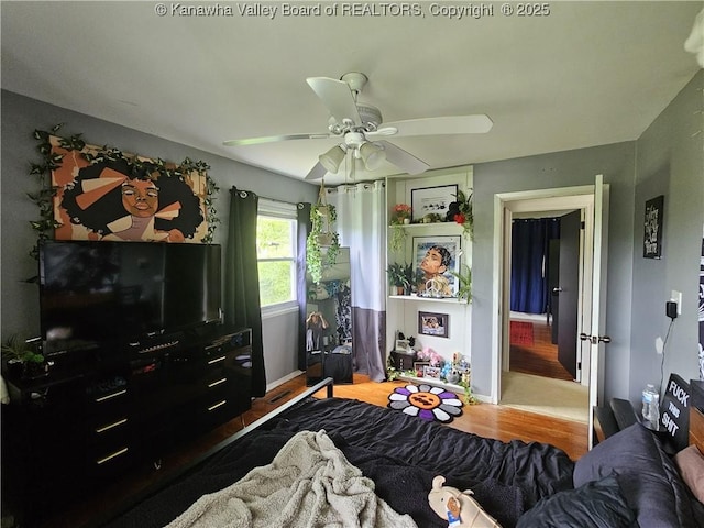 1000 Park Dr, Dunbar, WV 25064 - bedroom featuring wood finished floors, a ceiling fan, and baseboards