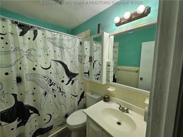 1000 Park Dr, Dunbar, WV 25064 - bathroom featuring toilet, tile walls, vanity, and curtained shower
