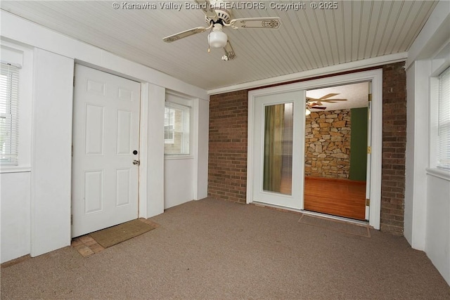 unfurnished sunroom featuring healthy amount of natural light