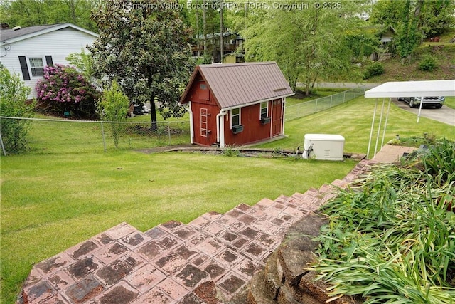 view of yard featuring an outbuilding and a storage unit