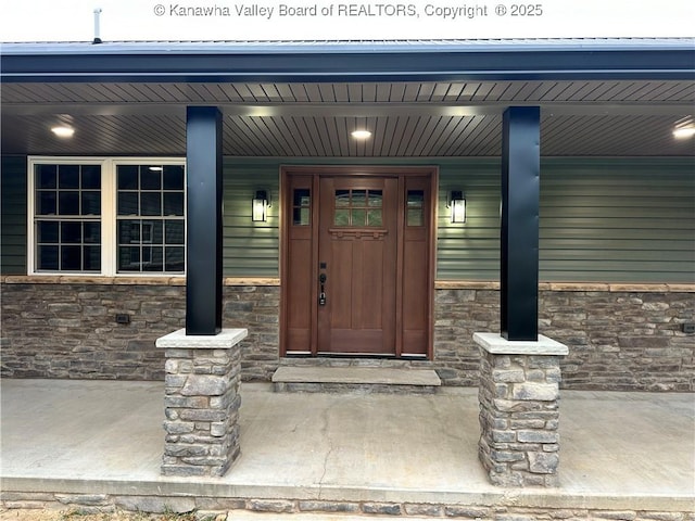 2885 Emma Rd, Given, WV 25245 - entrance to property with stone siding and covered porch