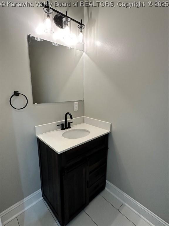 2885 Emma Rd, Given, WV 25245 - bathroom featuring vanity, tile patterned floors, and baseboards