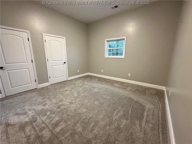 2885 Emma Rd, Given, WV 25245 - unfurnished bedroom with carpet flooring and baseboards