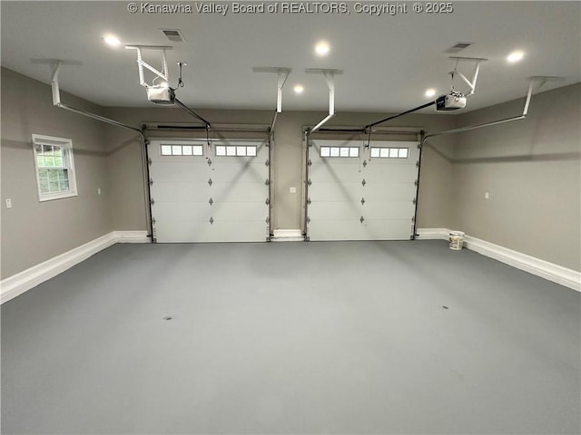 2885 Emma Rd, Given, WV 25245 - garage with a garage door opener and baseboards