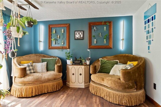 3589 Mount Union Rd, Fraziers Bottom, WV 25082 - sitting room with wood finished floors and ceiling fan