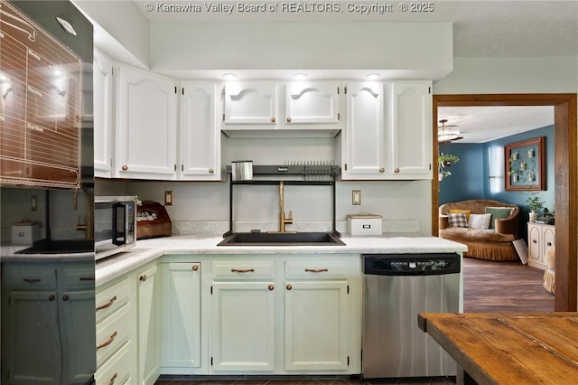3589 Mount Union Rd, Fraziers Bottom, WV 25082 - kitchen with appliances with stainless steel finishes, a sink, light countertops, and white cabinets