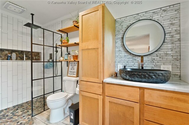 3589 Mount Union Rd, Fraziers Bottom, WV 25082 - bathroom featuring walk in shower, toilet, and vanity