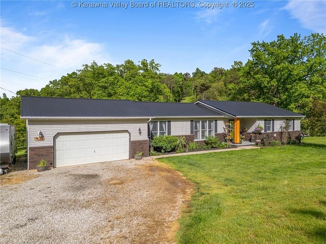 3589 Mount Union Rd, Fraziers Bottom, WV 25082 - ranch-style house with driveway, brick siding, a front lawn, an attached garage, and metal roof
