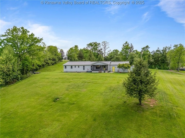 3589 Mount Union Rd, Fraziers Bottom, WV 25082 - back of house with a yard and view of scattered trees