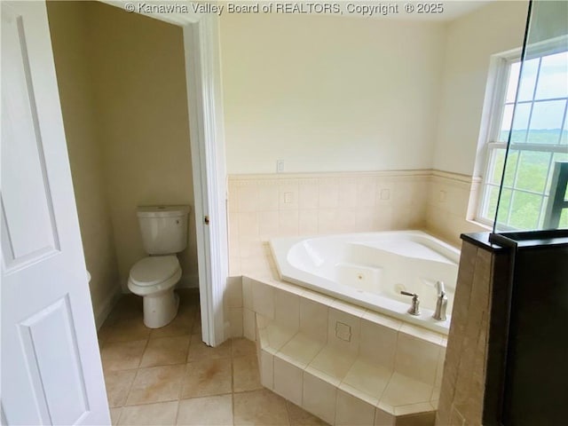 516 Woodbridge Dr, Charleston, WV 25311 - bathroom featuring a bath, tile patterned flooring, and toilet