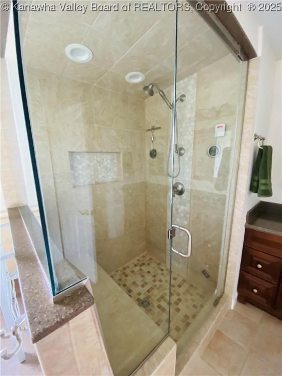 516 Woodbridge Dr, Charleston, WV 25311 - bathroom with a shower stall and tile patterned floors