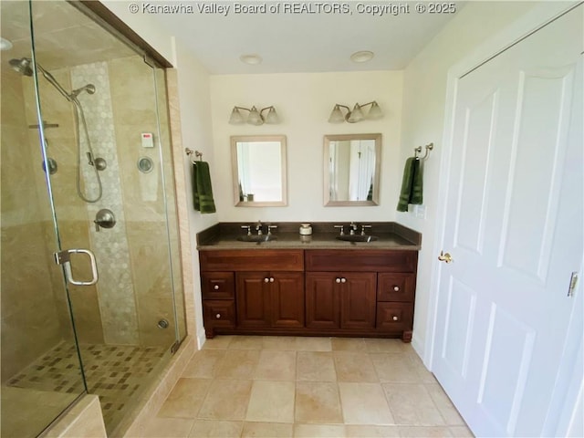 516 Woodbridge Dr, Charleston, WV 25311 - bathroom with a shower stall, tile patterned flooring, and double vanity