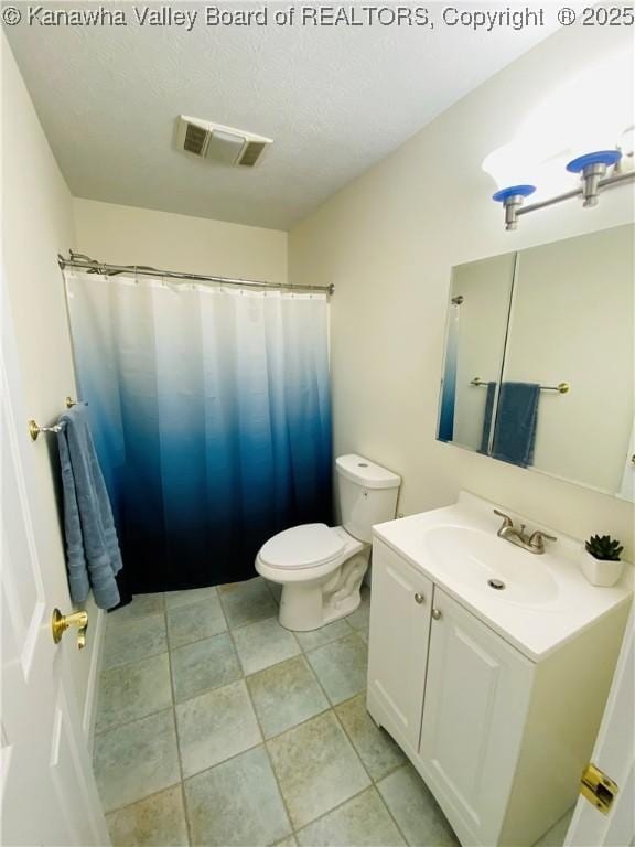 516 Woodbridge Dr, Charleston, WV 25311 - bathroom with vanity, toilet, and curtained shower