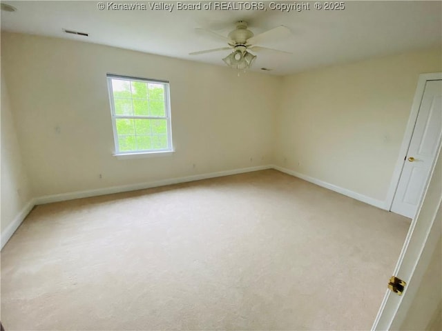 516 Woodbridge Dr, Charleston, WV 25311 - spare room with light carpet, ceiling fan, and baseboards
