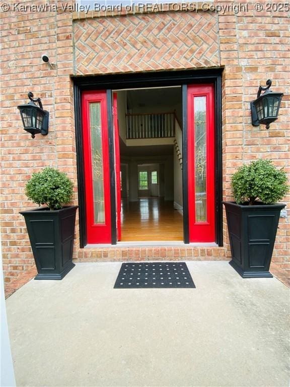 516 Woodbridge Dr, Charleston, WV 25311 - doorway to property with brick siding
