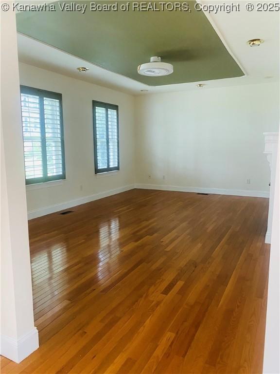516 Woodbridge Dr, Charleston, WV 25311 - unfurnished room featuring wood-type flooring and baseboards
