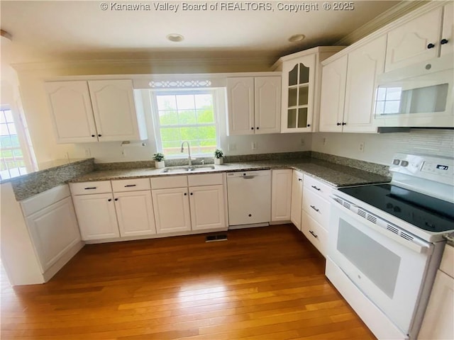 516 Woodbridge Dr, Charleston, WV 25311 - kitchen featuring white appliances, a sink, white cabinets, hardwood / wood-style floors, and ornamental molding