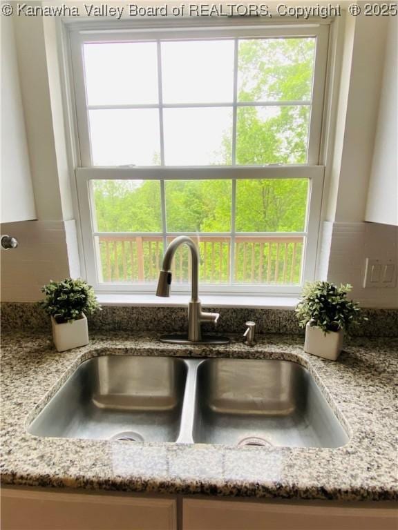 516 Woodbridge Dr, Charleston, WV 25311 - kitchen view of a sink and light stone countertops