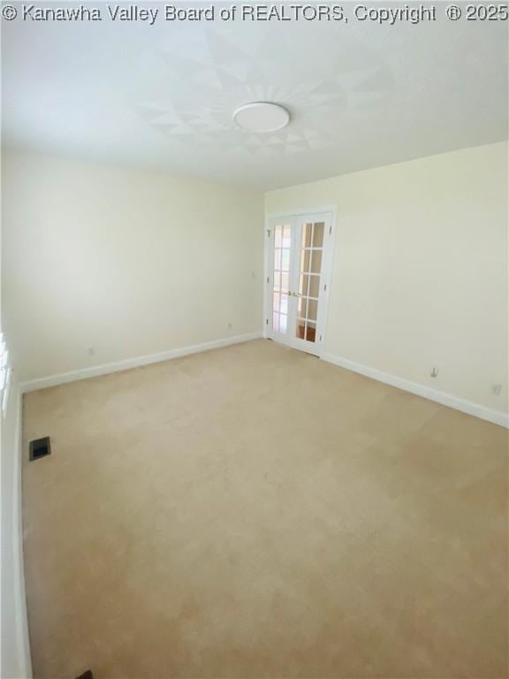 516 Woodbridge Dr, Charleston, WV 25311 - empty room featuring baseboards and light carpet