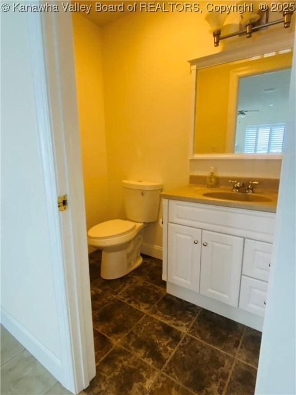 516 Woodbridge Dr, Charleston, WV 25311 - bathroom featuring toilet, vanity, baseboards, and tile patterned flooring