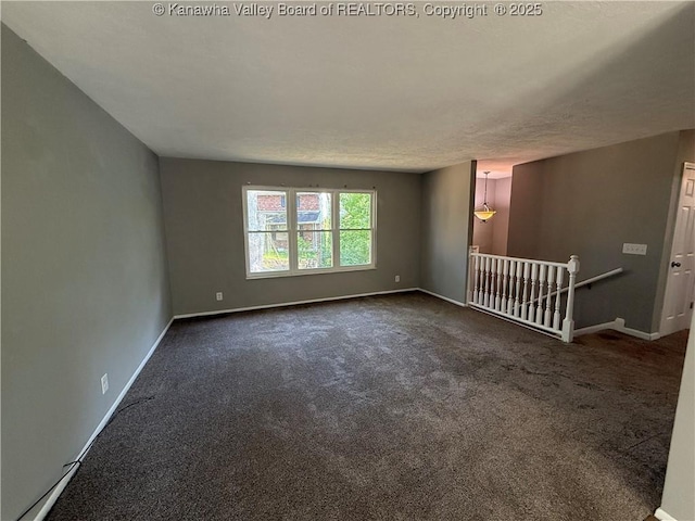 2 Stephanie Ln, Saint Albans, WV 25177 - spare room featuring dark carpet and baseboards