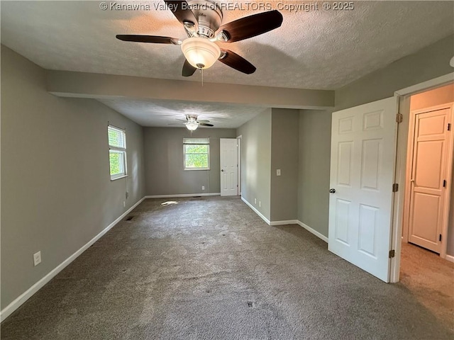 2 Stephanie Ln, Saint Albans, WV 25177 - carpeted spare room featuring a textured ceiling, ceiling fan, and baseboards