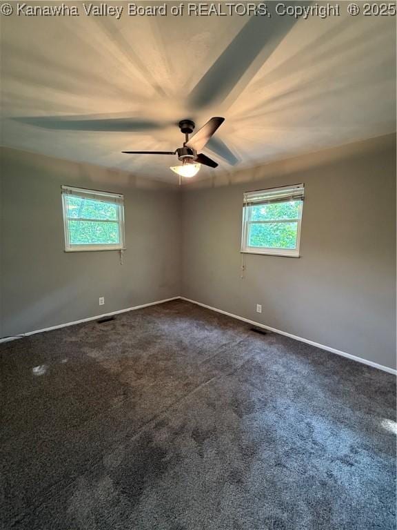 2 Stephanie Ln, Saint Albans, WV 25177 - empty room featuring healthy amount of natural light, ceiling fan, and baseboards
