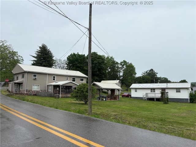 3888-3890 Charleston Rd, Gandeeville, WV 25243 - view of asphalt road with traffic signs