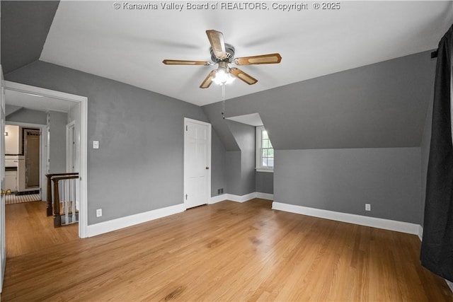 102 49th St SE, Charleston, WV 25304 - bonus room with vaulted ceiling, ceiling fan, wood finished floors, and baseboards