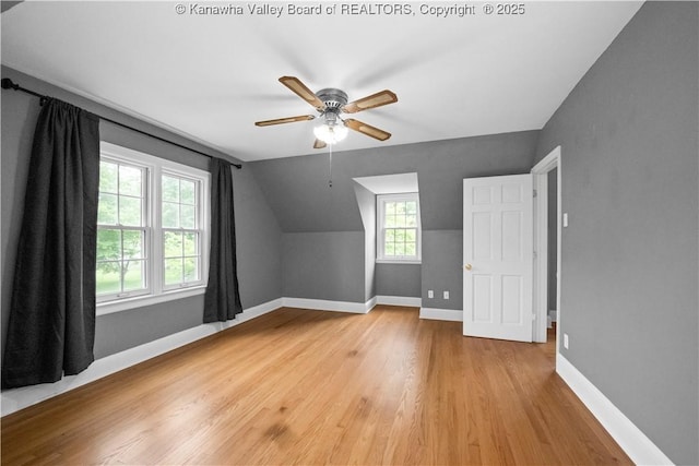 102 49th St SE, Charleston, WV 25304 - additional living space featuring a ceiling fan, light wood-type flooring, vaulted ceiling, and baseboards