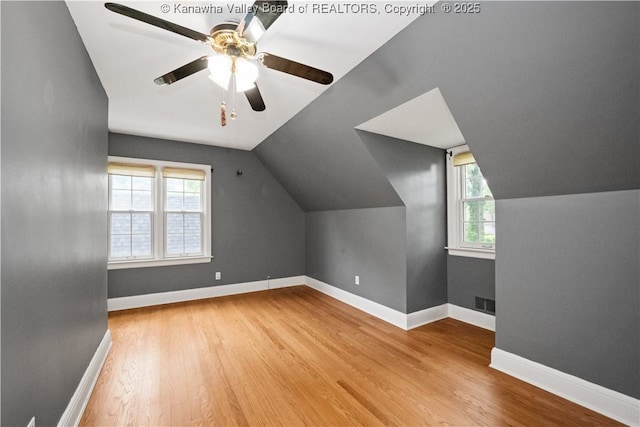 102 49th St SE, Charleston, WV 25304 - bonus room with wood finished floors, ceiling fan, lofted ceiling, and baseboards