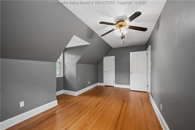 102 49th St SE, Charleston, WV 25304 - bonus room with a ceiling fan, wood finished floors, vaulted ceiling, and baseboards