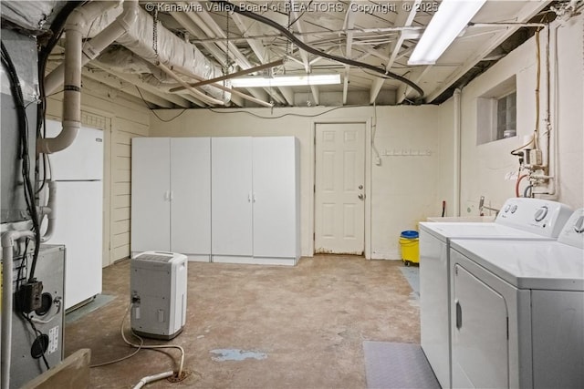 102 49th St SE, Charleston, WV 25304 - unfinished below grade area featuring separate washer and dryer