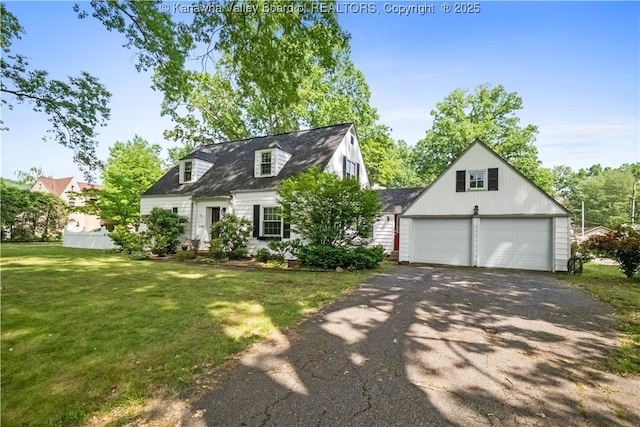 102 49th St SE, Charleston, WV 25304 - cape cod house featuring a front lawn and a garage