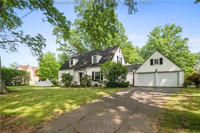 102 49th St SE, Charleston, WV 25304 - cape cod house featuring a front lawn and a garage