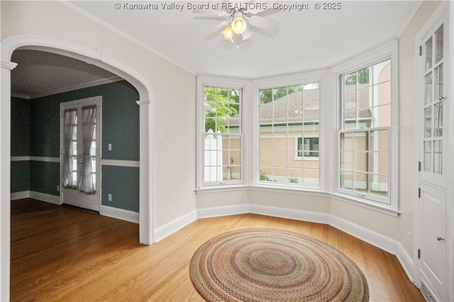 102 49th St SE, Charleston, WV 25304 - unfurnished sunroom featuring arched walkways and plenty of natural light
