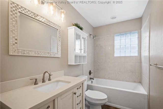 102 49th St SE, Charleston, WV 25304 - bathroom with toilet, washtub / shower combination, and vanity