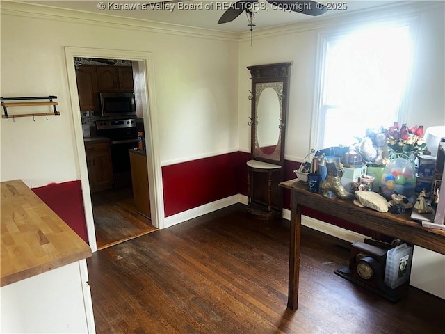 5106 Staunton Ave SE, Charleston, WV 25304 - dining room featuring dark wood-type flooring, ceiling fan, crown molding, and baseboards