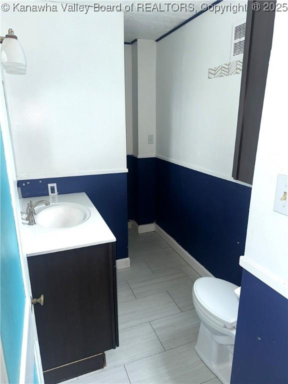 5106 Staunton Ave SE, Charleston, WV 25304 - bathroom with vanity and toilet
