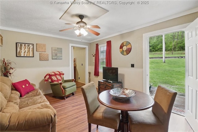 3282 Greenview Rd, South Charleston, WV 25303 - dining space with a ceiling fan, light wood finished floors, and crown molding
