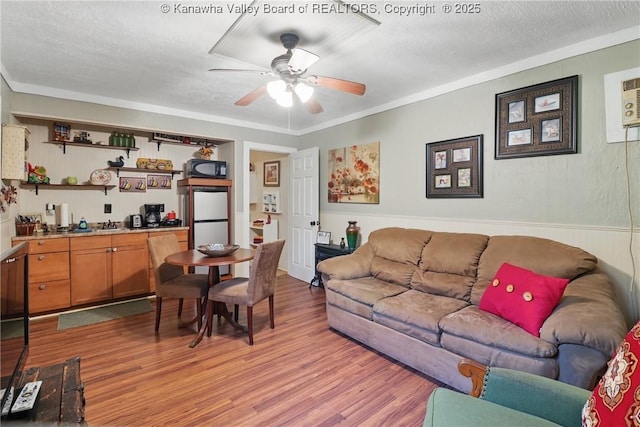 3282 Greenview Rd, South Charleston, WV 25303 - living room with a ceiling fan, wood finished floors, and a textured ceiling