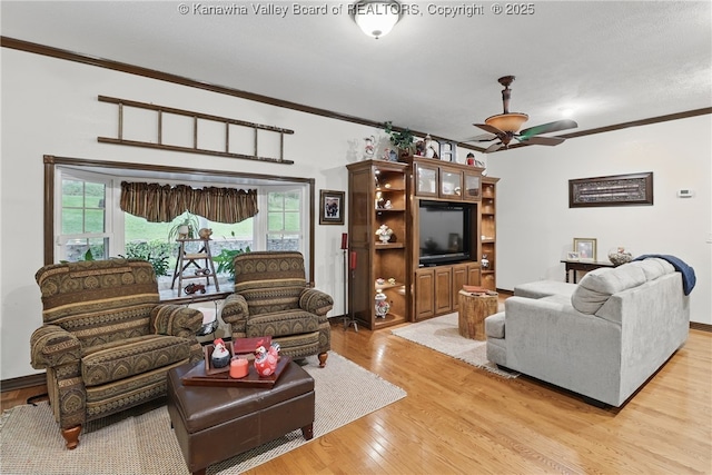 3282 Greenview Rd, South Charleston, WV 25303 - living area featuring a ceiling fan, ornamental molding, light wood-style floors, and healthy amount of natural light